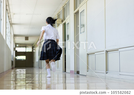 High school girl running on dash High school girl running on dash 105582082