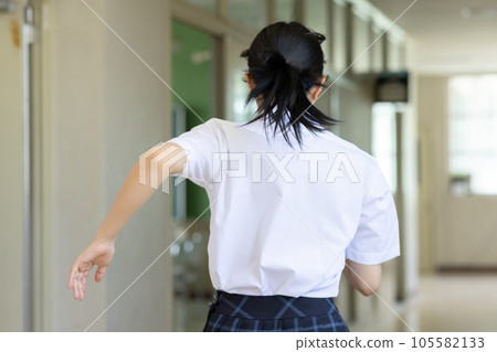 High school girl running on dash 105582133