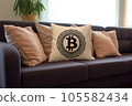 Pillow with Bitcoin symbol on a couch in modern interior, home decor with a popular cryptocurrency. Crypto in Real Estate concept. 105582434