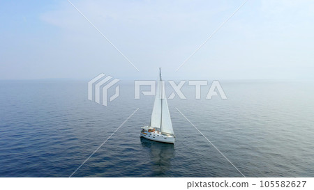 Sailing yacht in the sea. Beautiful aerial drone shot. Sailing yacht in the sea. Beautiful aerial drone shot. 105582627
