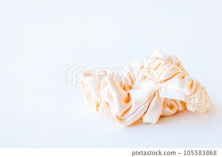 silk Scrunchy isolated on white background. Hairdressing tool of Colorful Elastic Hair Band, Bobble Scrunchie Hairband. square image 105583868