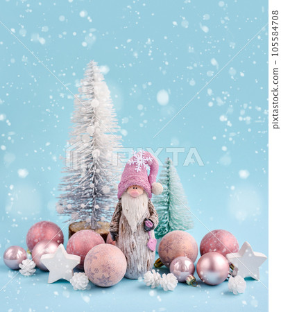 Christmas composition with gnome and festive decorations. Christmas or New Year greeting card. Christmas composition with gnome and festive decorations. Christmas or New Year greeting card. 105584708