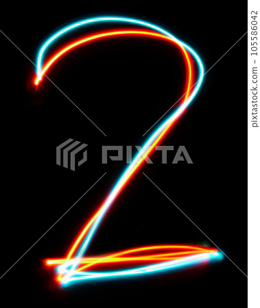 Number 2 of the alphabet made from neon sign. The blue red light image, long exposure with colored fairy lights, against a black background. 105586042