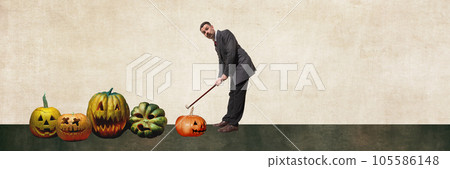 Elegant man in suit playing golf with pumpkins. Contemporary art collage. Banner 105586148