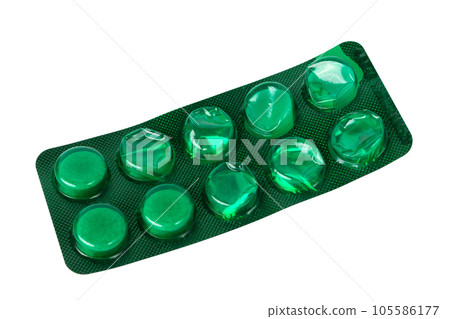 Empty green blister of pills isolated on white background. 105586177