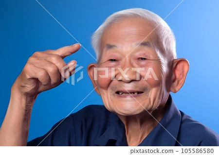 Asian grandfather looking and smiling with rised index finger on blue background, neural network generated art 105586580