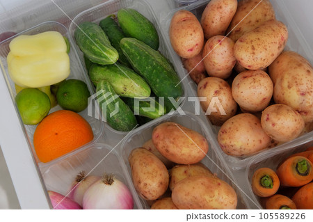 Various vegetables in containers in fridge. Gastronomy for cooking. Top view. Various vegetables in containers in fridge. Gastronomy for cooking. Top view. 105589226