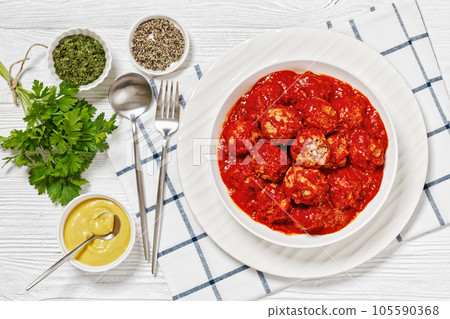 Iowa Ham Balls with tomato sauce in bowl Iowa Ham Balls with tomato sauce in bowl 105590368