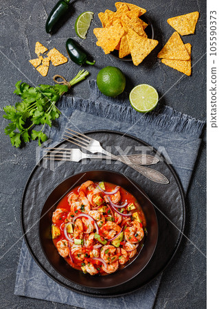 mexican shrimp cocktail salad in a bowl, top view mexican shrimp cocktail salad in a bowl, top view 105590373