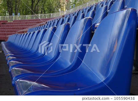 Plastic seating section on the grandstand of sport stadium Plastic seating section on the grandstand of sport stadium 105590438