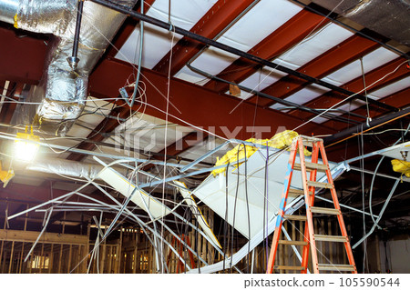 Ceiling works are an integral part of interior building reconstruction. Ceiling works are an integral part of interior building reconstruction. 105590544