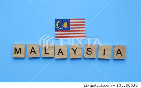 August 31, Malaysia Independence Day, Malaysia National Day, flag of Malaysia, minimalistic banner with the inscription in wooden letters August 31, Malaysia Independence Day, Malaysia National Day, flag of Malaysia, minimalistic banner with the inscription in wooden letters 105590630
