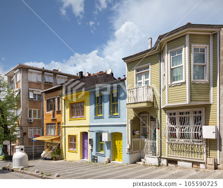 Row of colorful houses in Uskudar, on the Asian side of Istanbul, Turkey, painted in a variety of bright colors 105590725