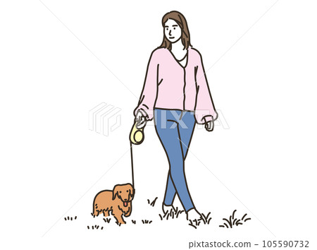 Young woman walking her dog outdoors 105590732