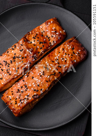 Delicious fresh grilled red fish with salt, spices and herbs Delicious fresh grilled red fish with salt, spices and herbs 105591151