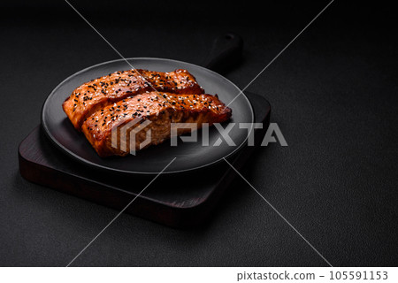 Delicious fresh grilled red fish with salt, spices and herbs Delicious fresh grilled red fish with salt, spices and herbs 105591153