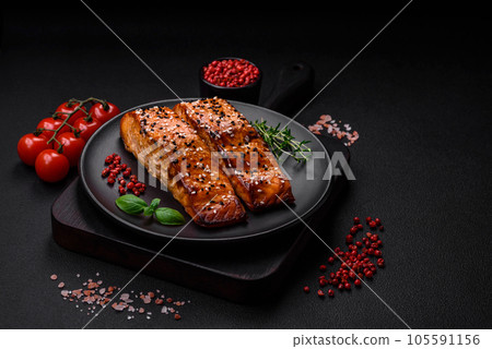 Delicious fresh grilled red fish with salt, spices and herbs Delicious fresh grilled red fish with salt, spices and herbs 105591156