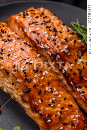 Delicious fresh grilled red fish with salt, spices and herbs Delicious fresh grilled red fish with salt, spices and herbs 105591163
