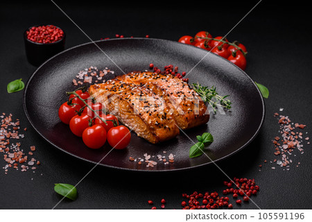 Delicious fresh grilled red fish with salt, spices and herbs Delicious fresh grilled red fish with salt, spices and herbs 105591196