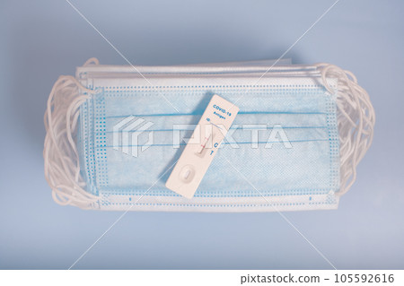 Test samples for coronavirus testing or analyzing, sterile medical mask on white background 105592616