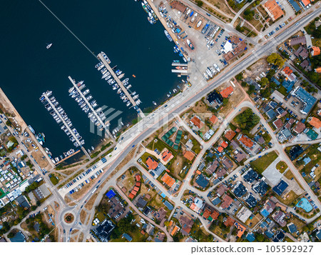 port and harbor with yachts and ships of Polish village Jastarnia, aerial view 105592927