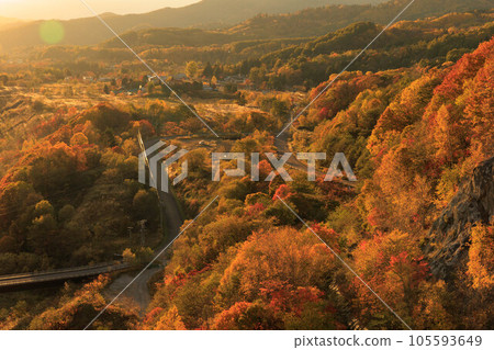 Yubari Shuparo Dam with colored leaves dyed in the setting sun ``Autumn Hokkaido'' Yubari Shuparo Dam with colored leaves dyed in the setting sun ``Autumn Hokkaido'' 105593649