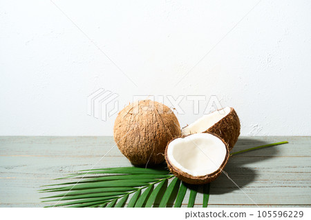 Coconut split in half 105596229
