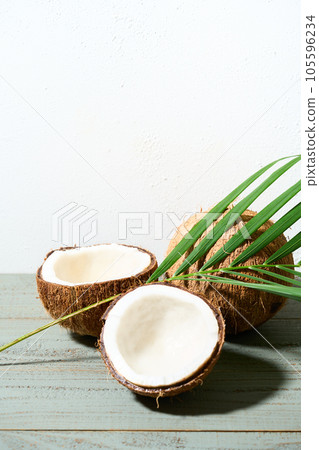 Coconut split in half 105596234