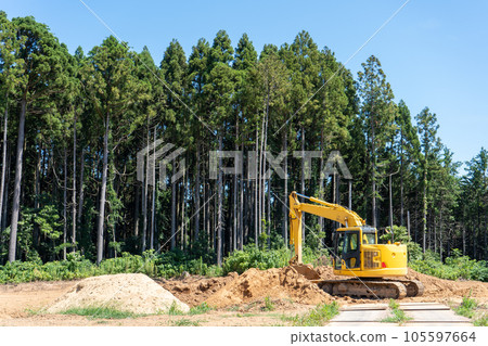 Image of a hydraulic excavator excavating earth and sand in a mountainous area | Image of residential land development | Image of destruction of nature | Construction image Image of a hydraulic excavator excavating earth and sand in a mountainous area | Image of residential land development | Image of destruction of nature | Construction image 105597664