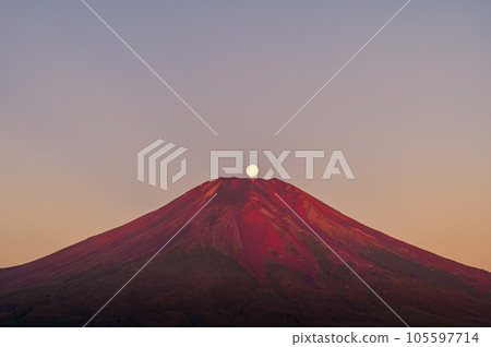 (Pearl Fuji) The summit of Mt. Fuji dyed in the morning glow and the full moon setting (Pearl Fuji) The summit of Mt. Fuji dyed in the morning glow and the full moon setting 105597714