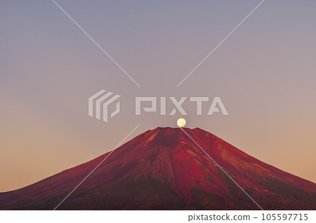 (Pearl Fuji) The summit of Mt. Fuji dyed in the morning glow and the full moon setting (Pearl Fuji) The summit of Mt. Fuji dyed in the morning glow and the full moon setting 105597715