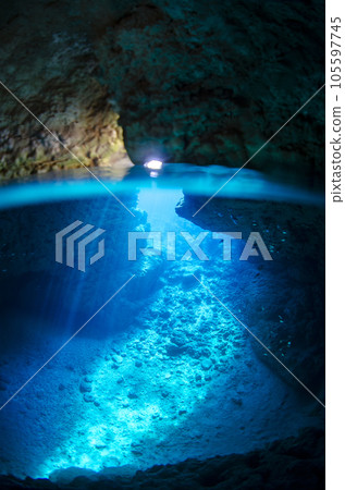 Okinawa, Onna village, sea and half water surface seen from the blue cave (vertical).4 Okinawa, Onna village, sea and half water surface seen from the blue cave (vertical).4 105597745
