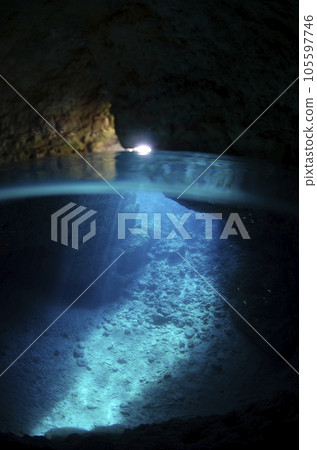 Okinawa, Onna village, sea and half water surface seen from the blue cave (vertical).5 105597746