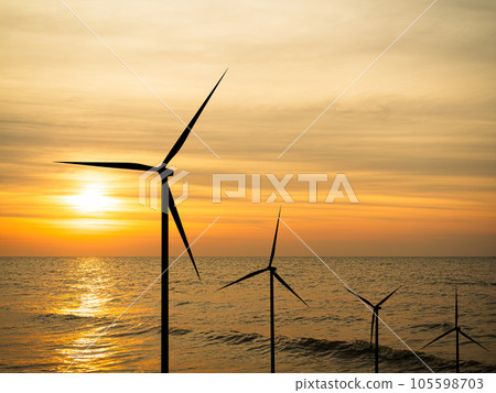 Wind Mill Turbine on Sea Offshore Farm, Energy Windmill Sustainable with Red Sunset Ocean Industry on Water, Power Electric Plant view Landscape, Powerplant Windfarm Change for Co2 Environment. Wind Mill Turbine on Sea Offshore Farm, Energy Windmill Sustainable with Red Sunset Ocean Industry on Water, Power Electric Plant view Landscape, Powerplant Windfarm Change for Co2 Environment. 105598703