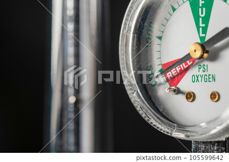 Close-up of medical oxygen flow meter  shows low oxygen or an nearly empty tank 105599642