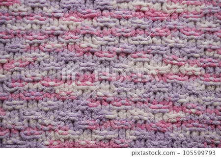 Pink and purple pastel color knitting pattern background 105599793