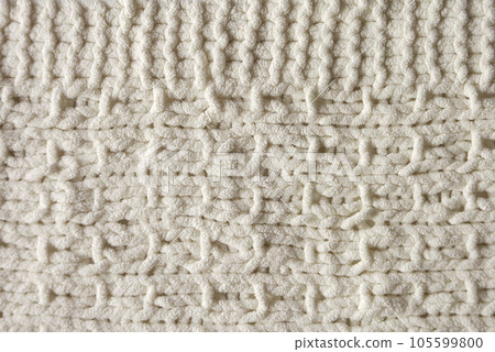 White knitting pattern textile background 105599800