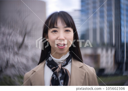 young woman in casual coat young woman in casual coat 105602306