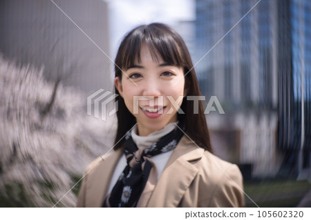 young woman in casual coat young woman in casual coat 105602320