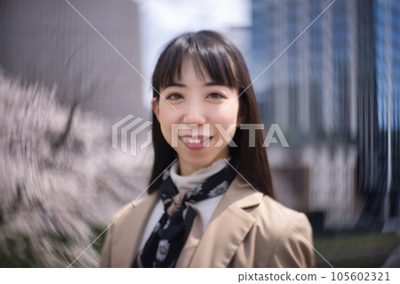 young woman in casual coat 105602321