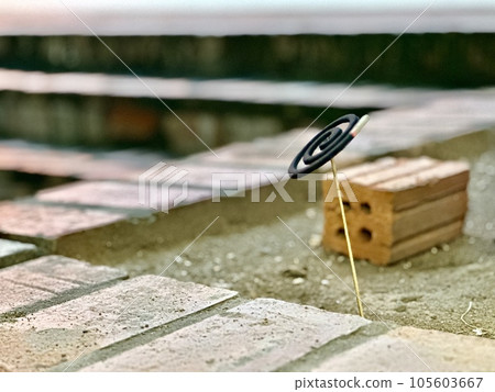 Black spiral mosquito repellent coil 105603667