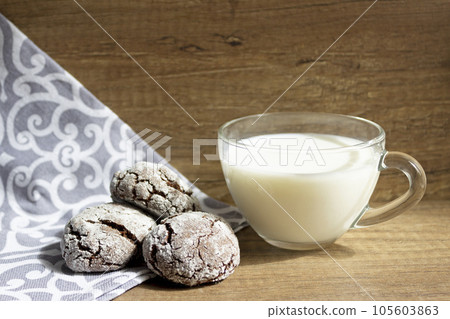 Breakfast with milk, chocolate chip cookies and a cup of fresh milk 105603863