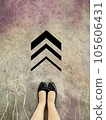 Woman standing on the concrete street  105606431