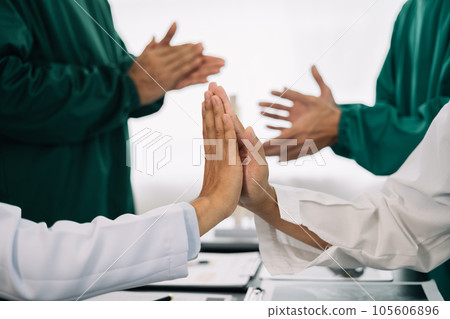 Applause, success with doctors in meeting for presentation, medical and research. Training, healthcare with group of people workshop event for medicine, target or teamwork. 105606896