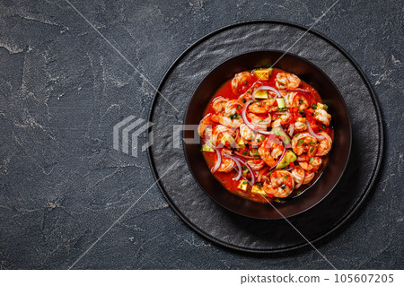 mexican shrimp cocktail salad in a bowl, top view mexican shrimp cocktail salad in a bowl, top view 105607205