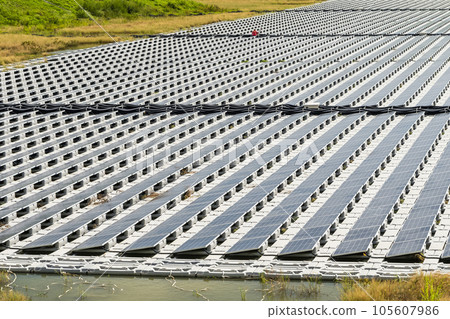 View of the floating Solar power system on the flood detention basin in Kaohsiung, Taiwan. View of the floating Solar power system on the flood detention basin in Kaohsiung, Taiwan. 105607986