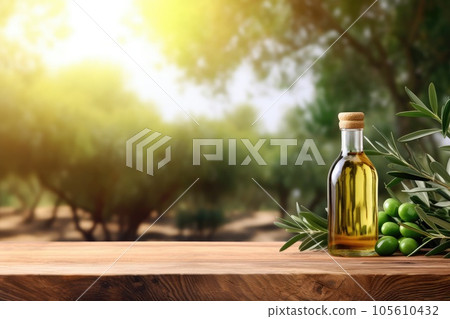 Old wooden product display table with natural green olive field and olive oil 105610432
