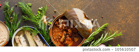 Open tin cans with canned fish 105610507