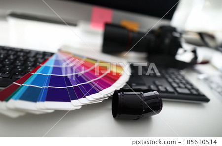 Film tape on office desk Film tape on office desk 105610514
