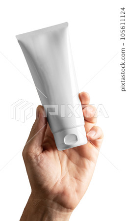 Men hand holding cosmetic product mockup, cream tube isolated on white background 105611124